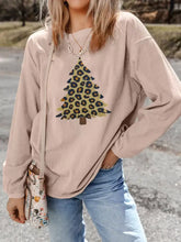 Beige corduroy oversized fit hoodie featuring a leopard christmas tree graphic with care instructions label visible
