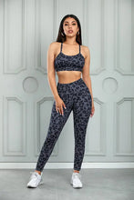 Leopard cutout sports bra and high-waisted leggings set for women