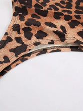 Leopard long sleeve bodysuit with tan and black leopard print in smooth stretchy fabric for comfortable wear