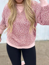 Pink leopard-print relaxed fit sweatshirt with soft cozy texture ribbed cuffs and slightly stretchy fabric