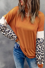 Women’s leopard long sleeve round neck sweatshirt in rust with cream sleeves