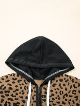 Black quarter zip hoodie with tan and black leopard print body white drawstrings and contrast stitching slightly stretchy