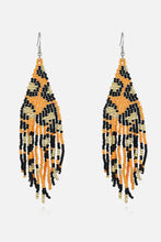 Leopard print beaded dangle earrings with fringe in orange, black, beige