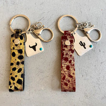 Leopard print faux fur genuine leather alloy keychain with bull skull charm