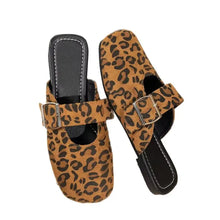 Pair of leopard print buckled square toe faux suede flat loafers