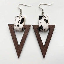 Cow print geometric drop earrings with wooden accents and silver hooks