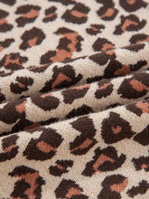 Leopard print high neck shift mini sweater dress in soft knitted brown tan fabric