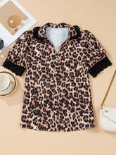 Leopard print lace trim short sleeve shirt with black lace trim on collar and cuffs and button down front