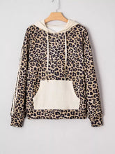 Beige and black leopard print long sleeve hoodie with contrasting cream ribbed pocket and matching drawstrings slightly stretchy and machine wash safe