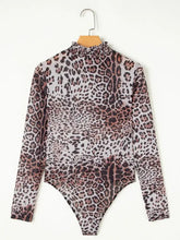 Sheer leopard print long sleeve bodysuit with mock neck, ruffled collar, and gradient dark brown to light pink color