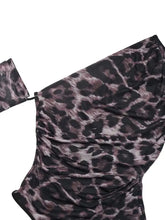 A ruched leopard print one shoulder long sleeve bodysuit in black and muted purple fabric