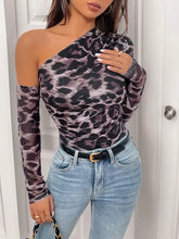 Leopard print one shoulder long sleeve bodysuit in black and gray stretchy fabric with fitted design