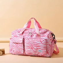 Leopard print travel bag in pink zebra oxford cloth with adjustable strap
