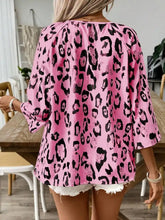 Pink leopard print v neck blouse with three quarter sleeves and relaxed fit in soft fabric for casual wear