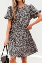 Gray and black leopard print tiered denim dress with round neck puff short sleeves and a stylish casual design