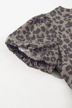 Gray leopard print short-sleeved top with ruffled cuffs paired with a round neck puff sleeve denim dress