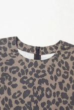 Taupe and black leopard print round neck puff sleeve top with zipper closure in denim dress style
