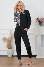 Black and leopard-print long-sleeved jumpsuit with drawstring waistband featuring full sleeve length for lounge wear