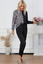 Leopard round neck top with black and leopard print long sleeve length and drawstring waist for lounge wear