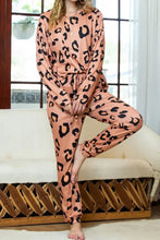 Soft peach leopard round neck top and drawstring pants lounge set with black spots and long sleeve length