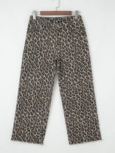 Brown and beige leopard straight loose leg wide-leg denim jeans with frayed hem in leopard print pattern