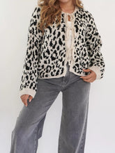 Cozy leopard print tie-front cardigan in cream and black knit