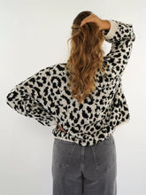 Cozy leopard print tie-front cardigan in black and white knit