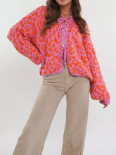 Vibrant leopard print tie-front cardigan in pink and orange