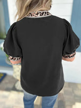 Black puff sleeve blouse with leopard trim puff at collar and cuffs for stylish casual wear