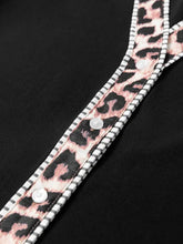 Leopard trim puff sleeve blouse with pink and black leopard print fabric strap white buttons and striped edge