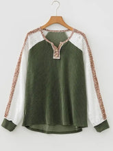 Olive green ribbed knit leopard trim raglan sleeve top with white lace and leopard print trim on sleeves collar and cuffs