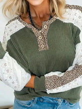 Olive green ribbed knit leopard trim raglan sleeve top with white lace and leopard print accents on sleeves and placket