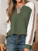 Olive green ribbed knit leopard trim raglan sleeve top with white lace and leopard print accents on sleeves