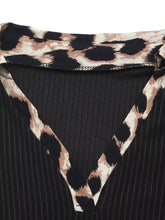 Black and beige leopard trim ribbed knit bodysuit with v-neck and ribbed fabric detail in a stylish trim ribbed knit design