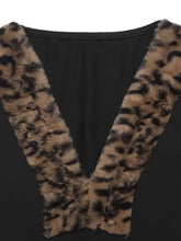 Black long sleeve bodysuit with v neck trim and faux leopard fur detailing for stylish wear