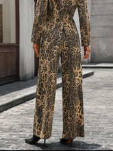 A stylish leopard wide-leg jeans set with tailored blazer in tan and dark brown smooth fabric