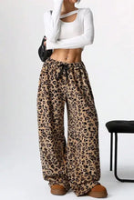 Leopard wide leg pants with drawstring waist and elastic cuffs