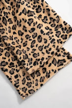 Leopard print faux fur scarf in beige and black on wide leg pants