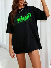 Black oversized letter graphic round neck half sleeve t-shirt with neon green design