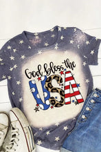 Bleached dark blue graphic round neck short sleeve shirt with white stars and God Bless the USA letters