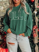 Green corduroy letter round neck sweatshirt with white outlined olly lettering in slightly stretchy material machine wash cold
