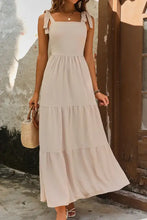 Light beige tie shoulder smocked tiered maxi dress with bow details