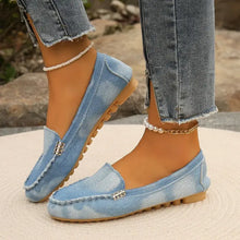 Light blue denim round toe flat loafers with silver buckle and pearl anklet