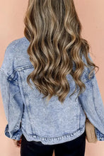 Light blue distressed denim jacket with patch pockets