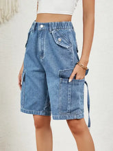 Light blue elastic waist denim shorts with buttoned cargo pockets