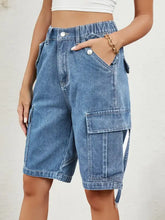 Light blue elastic waist denim shorts with buttoned cargo pockets