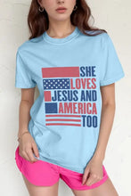 Light blue round neck short sleeve t-shirt with distressed flag graphic