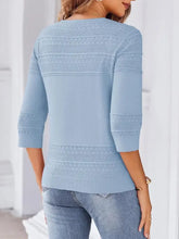 Light blue slightly stretchy sleeve cardigan with textured three-quarter sleeves