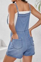 Light blue square neck denim overalls with cuffed hems and pockets
