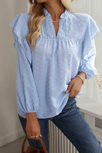 Light blue swiss dot ruffled long sleeve blouse with lace V-neck trim